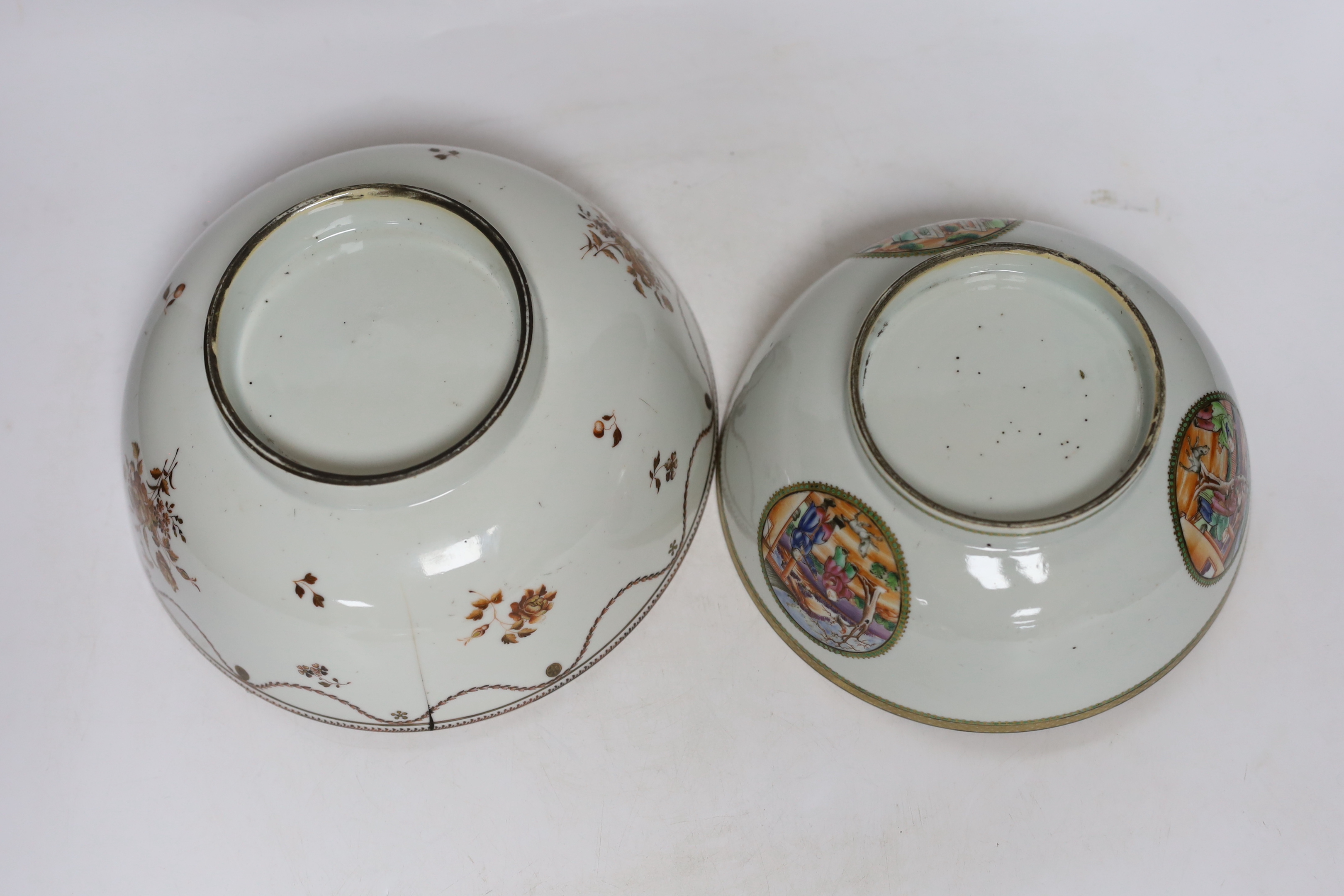 A Chinese famille rose bowl and dish and two similar bowls, all Qianlong period, largest diameter 23cm